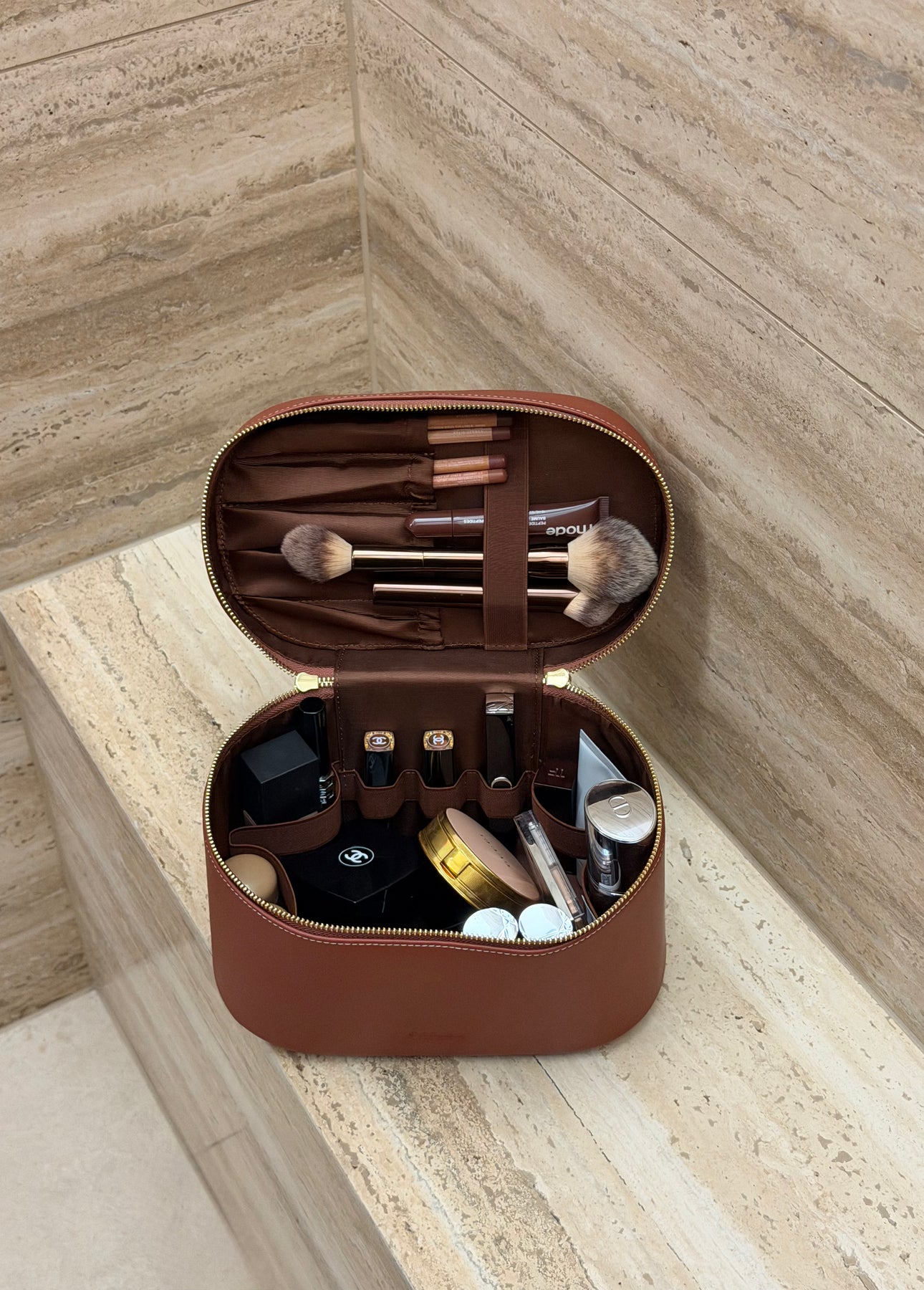warm bathroom with amber vanity case CASCAS makeup organizer aesthetic