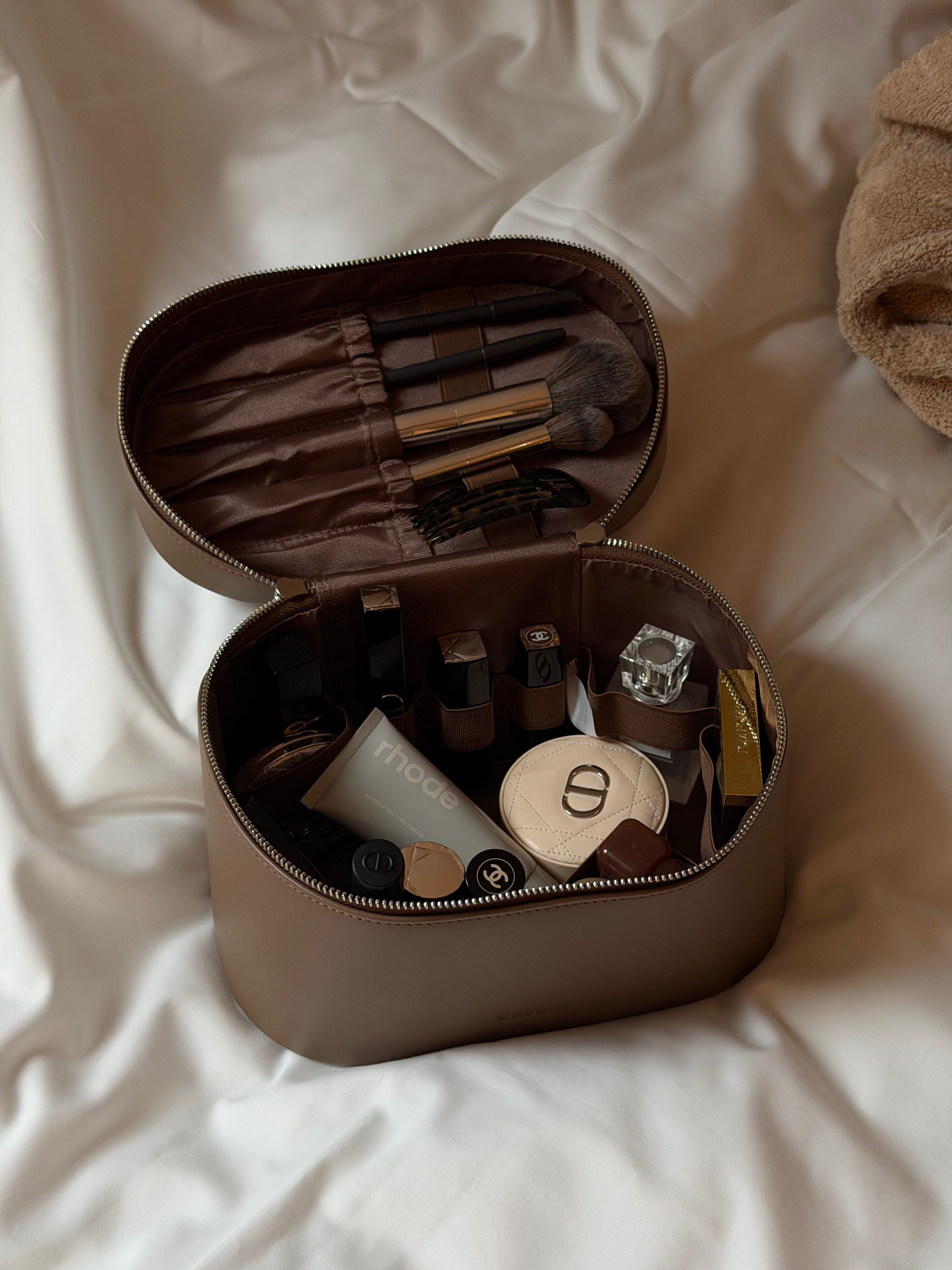 minimal bathroom with sand vanity case CASCAS makeup organizer aesthetic